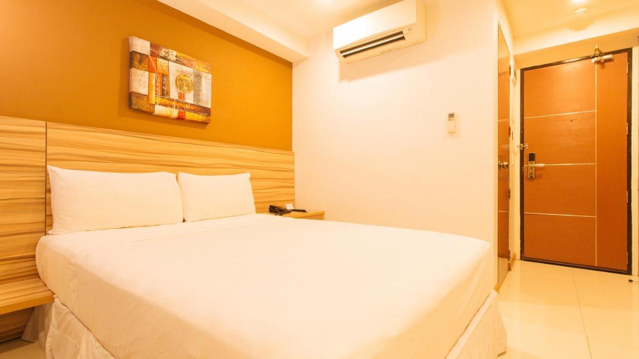 Guijo Suites Makati Макати Экстерьер фото
