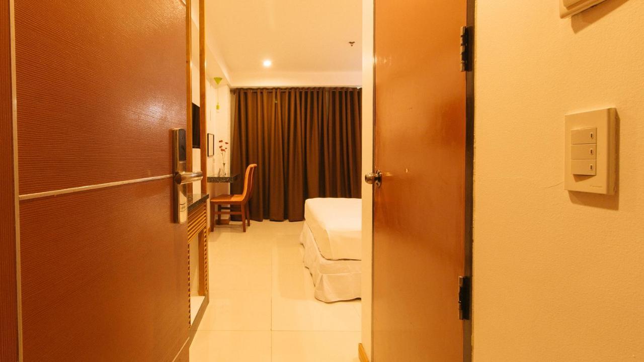 Guijo Suites Makati Макати Экстерьер фото