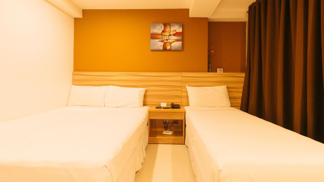 Guijo Suites Makati Макати Экстерьер фото
