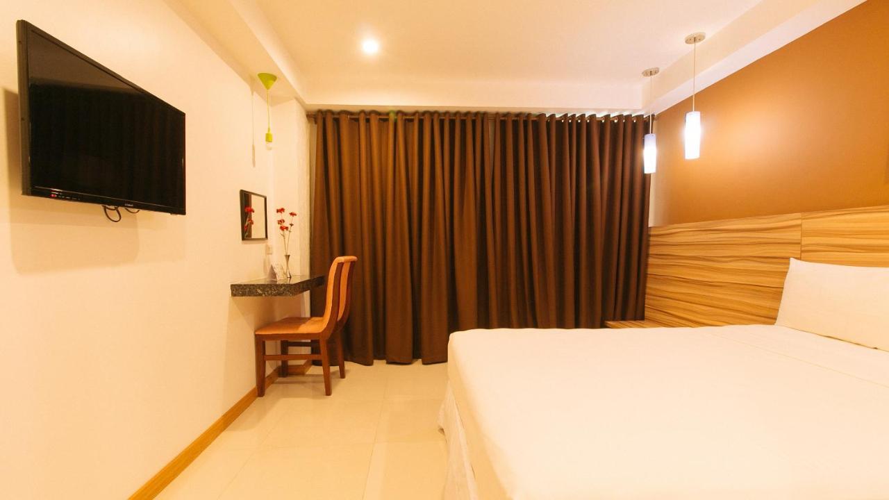 Guijo Suites Makati Макати Экстерьер фото