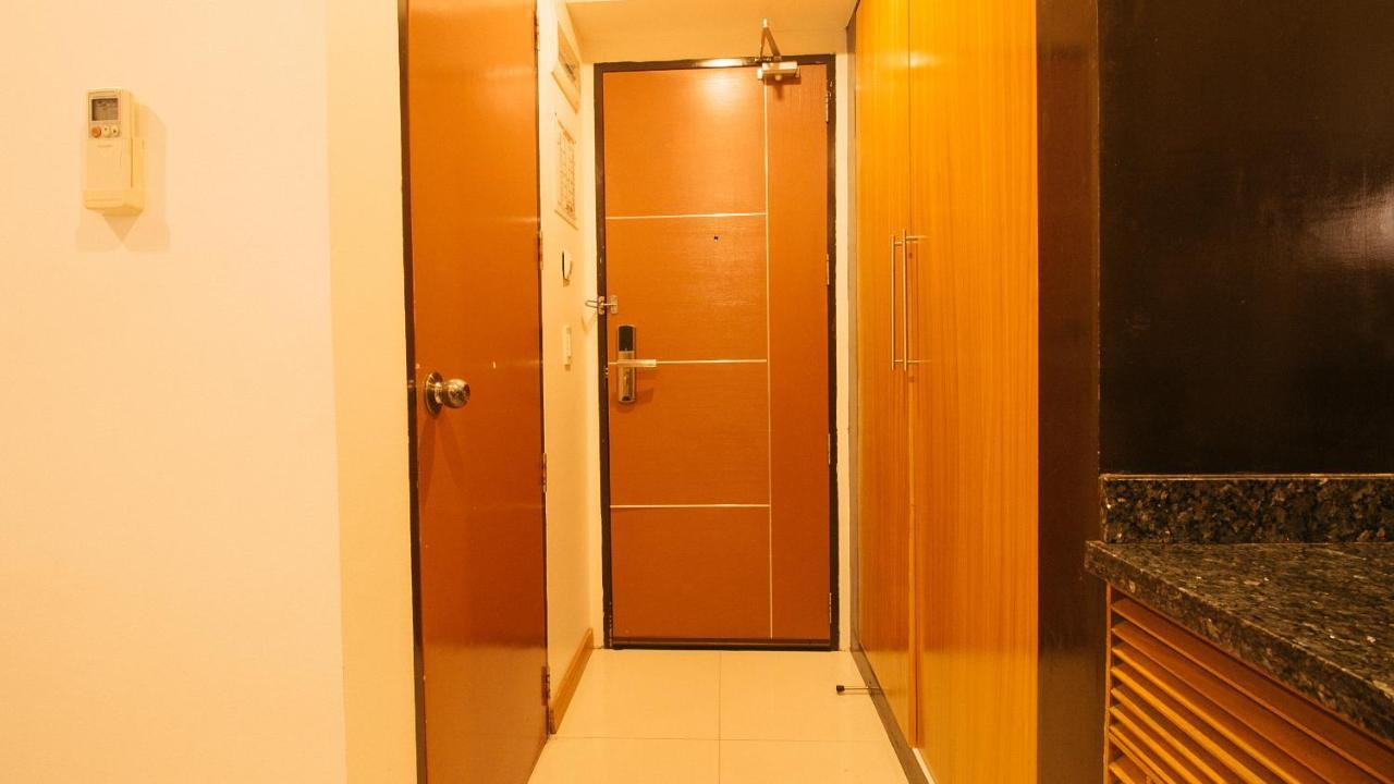 Guijo Suites Makati Макати Экстерьер фото