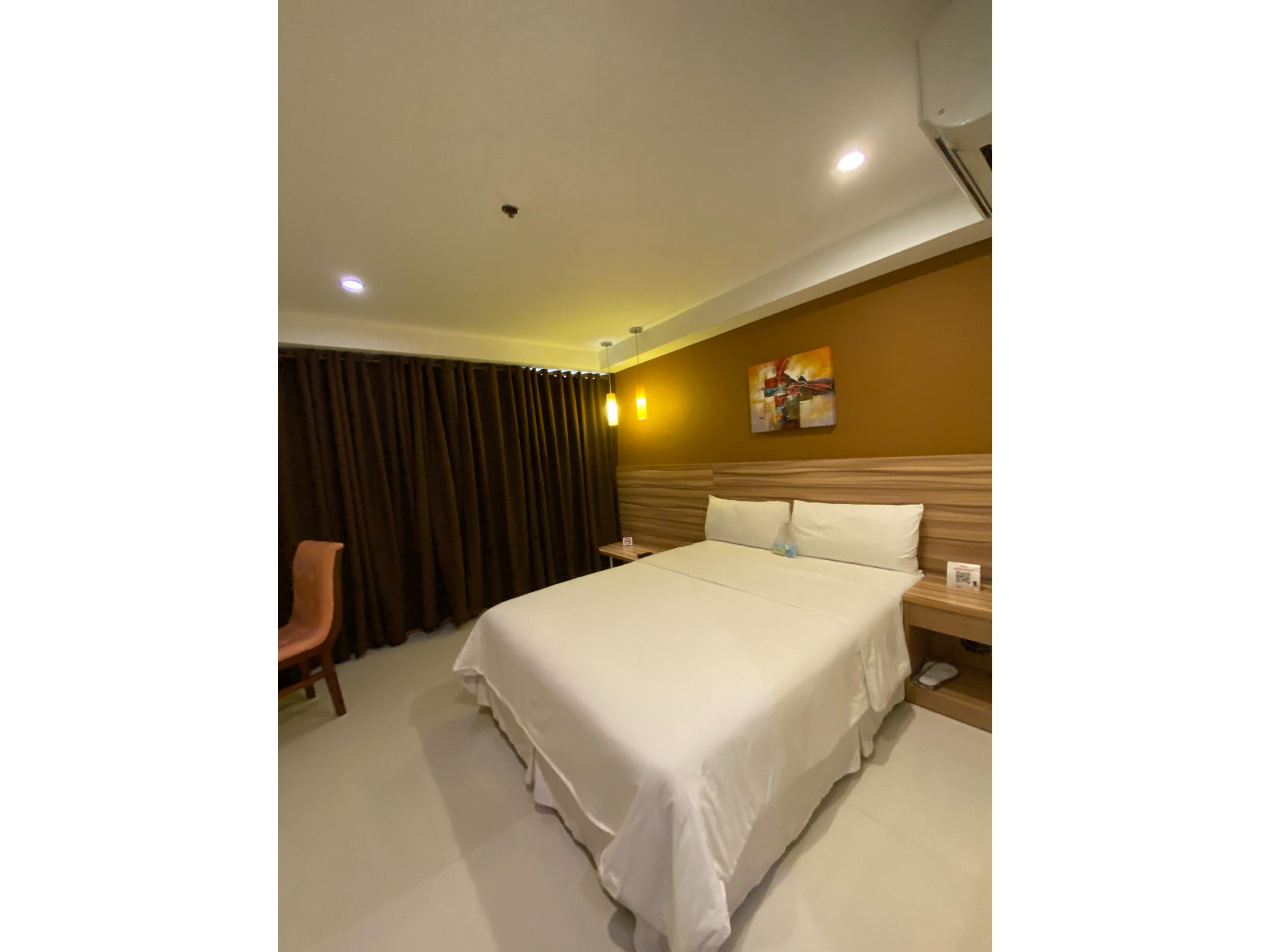 Guijo Suites Makati Макати Экстерьер фото