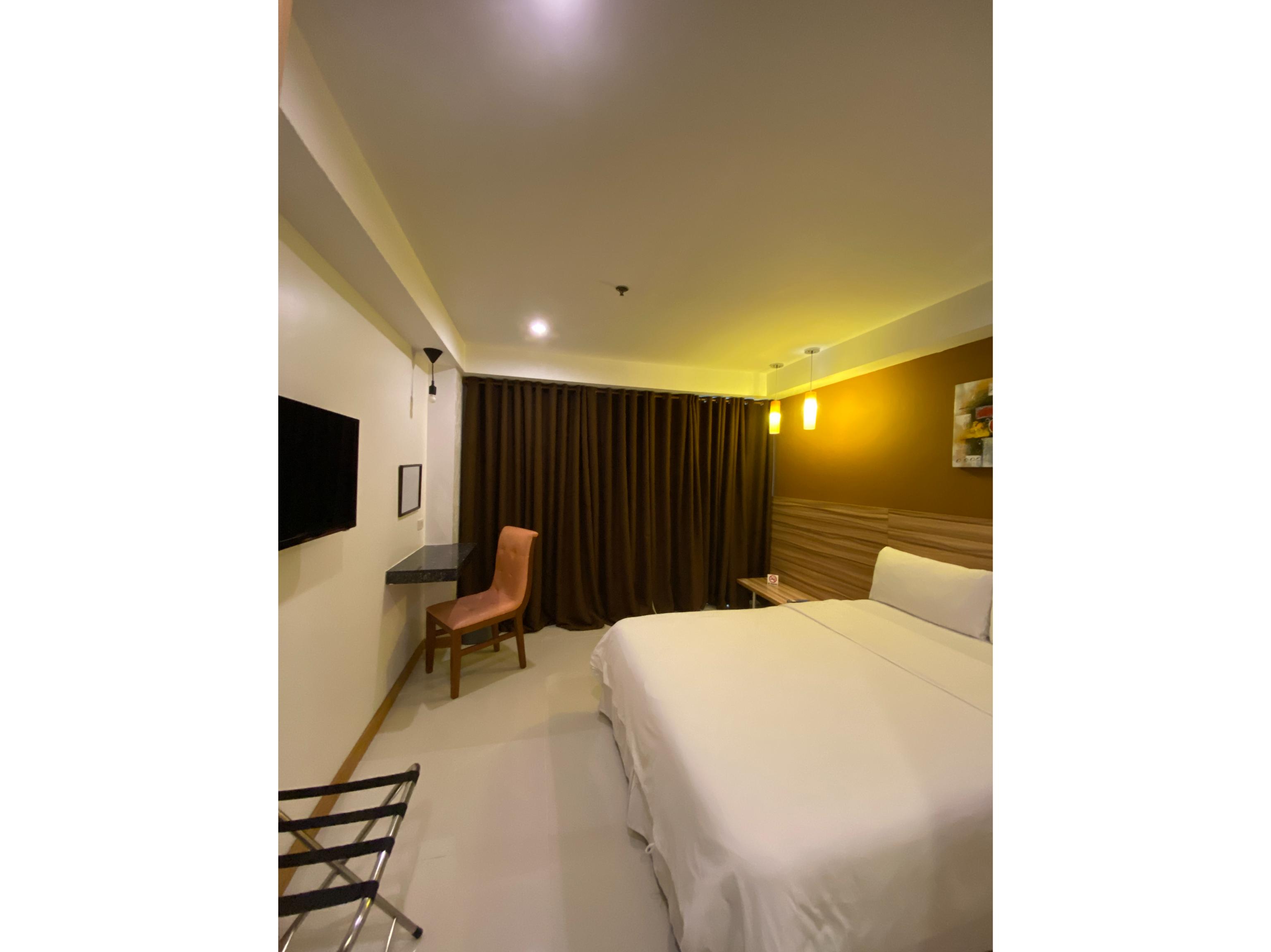 Guijo Suites Makati Макати Экстерьер фото