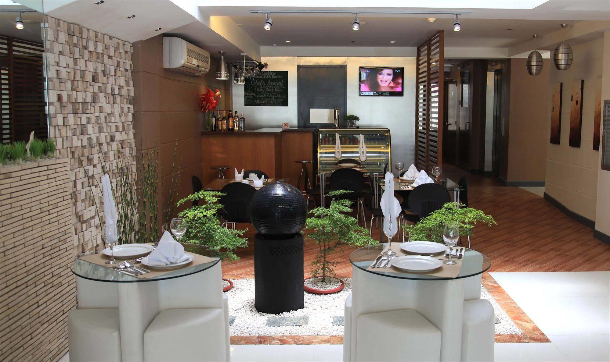 Guijo Suites Makati Макати Экстерьер фото